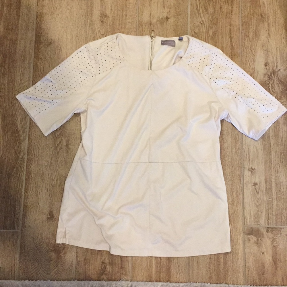 Cream soft top that no longer fits me.